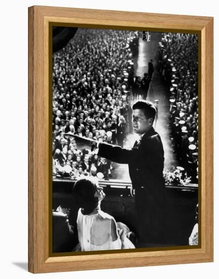 President John Kennedy Next to His Wife Jacqueline Overlooking Crowd Attending His Inaugural Ball-Paul Schutzer-Framed Premier Image Canvas