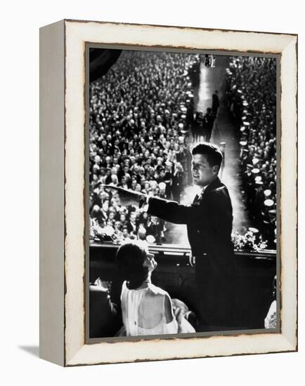 President John Kennedy Next to His Wife Jacqueline Overlooking Crowd Attending His Inaugural Ball-Paul Schutzer-Framed Premier Image Canvas