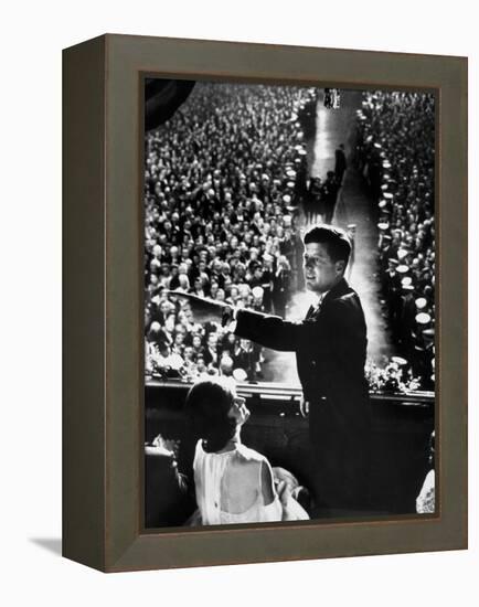 President John Kennedy Next to His Wife Jacqueline Overlooking Crowd Attending His Inaugural Ball-Paul Schutzer-Framed Premier Image Canvas