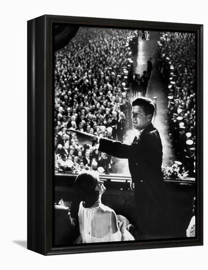 President John Kennedy Next to His Wife Jacqueline Overlooking Crowd Attending His Inaugural Ball-Paul Schutzer-Framed Premier Image Canvas