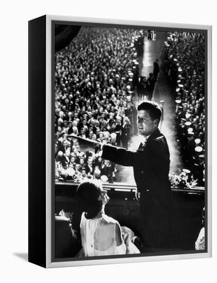 President John Kennedy Next to His Wife Jacqueline Overlooking Crowd Attending His Inaugural Ball-Paul Schutzer-Framed Premier Image Canvas