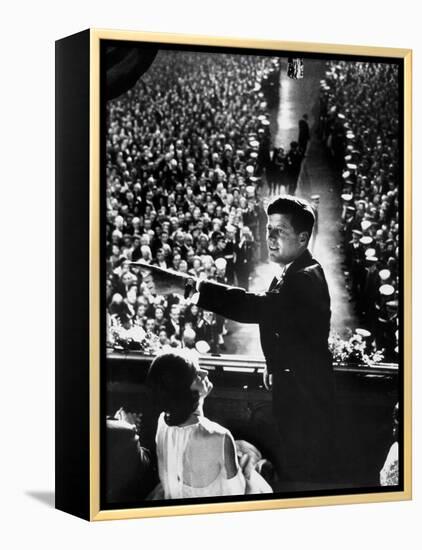 President John Kennedy Next to His Wife Jacqueline Overlooking Crowd Attending His Inaugural Ball-Paul Schutzer-Framed Premier Image Canvas