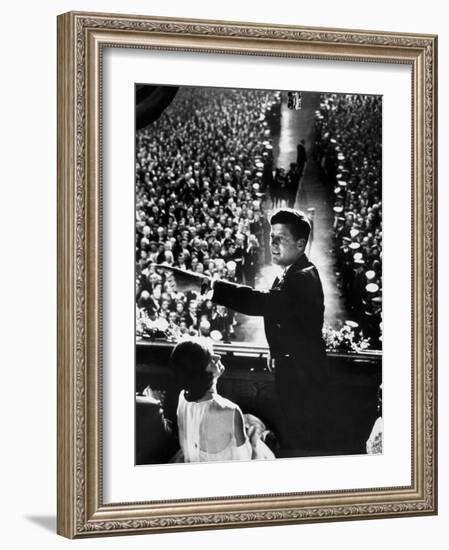 President John Kennedy Next to His Wife Jacqueline Overlooking Crowd Attending His Inaugural Ball-Paul Schutzer-Framed Photographic Print