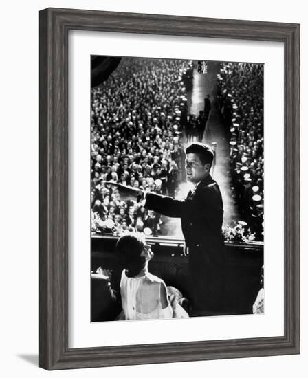 President John Kennedy Next to His Wife Jacqueline Overlooking Crowd Attending His Inaugural Ball-Paul Schutzer-Framed Photographic Print