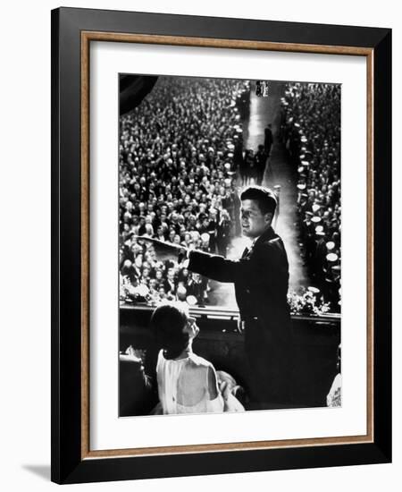 President John Kennedy Next to His Wife Jacqueline Overlooking Crowd Attending His Inaugural Ball-Paul Schutzer-Framed Photographic Print