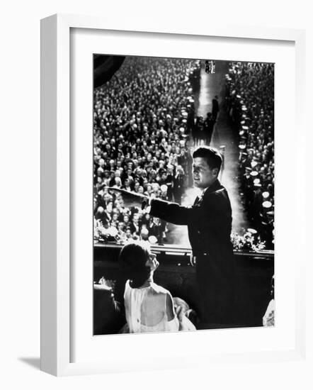 President John Kennedy Next to His Wife Jacqueline Overlooking Crowd Attending His Inaugural Ball-Paul Schutzer-Framed Photographic Print