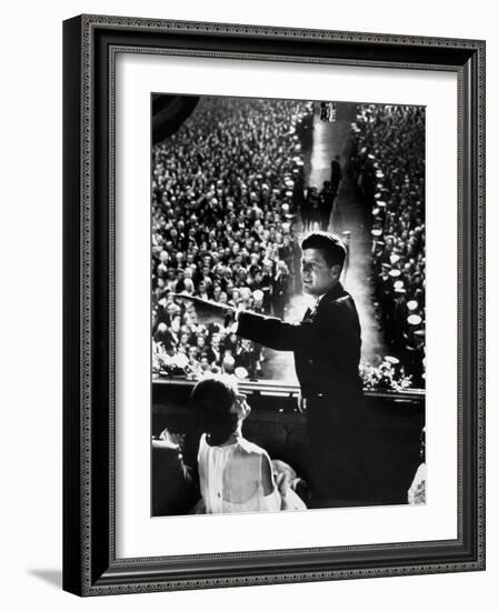 President John Kennedy Next to His Wife Jacqueline Overlooking Crowd Attending His Inaugural Ball-Paul Schutzer-Framed Photographic Print