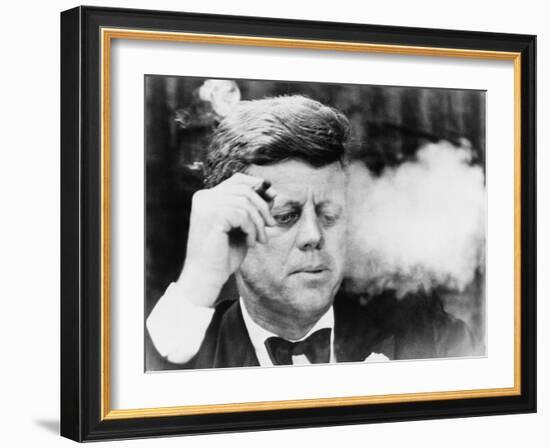 President John Kennedy, Smoking a Cigar at a Democratic Fundraiser, Oct. 19, 1963-null-Framed Photo