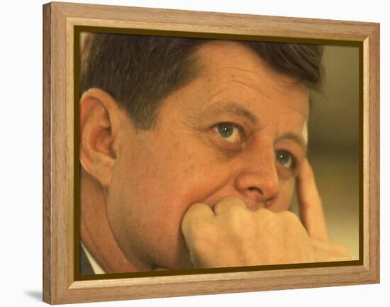 President Kennedy in Pensive Portrait-Paul Schutzer-Framed Premier Image Canvas