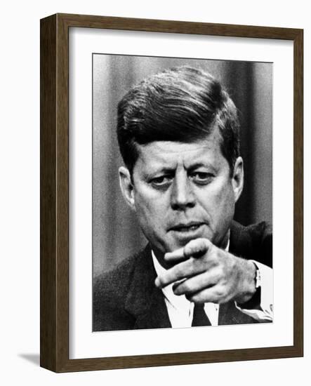 President Kennedy Pointing to a Reporter During a Press Conference, Feb 14, 1963-null-Framed Photo