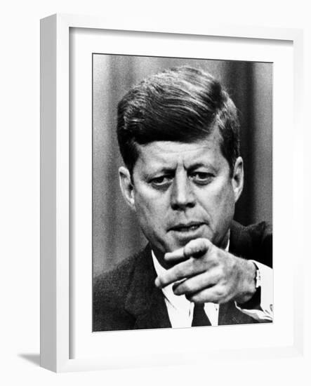 President Kennedy Pointing to a Reporter During a Press Conference, Feb 14, 1963-null-Framed Photo