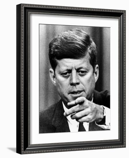 President Kennedy Pointing to a Reporter During a Press Conference, Feb 14, 1963-null-Framed Photo