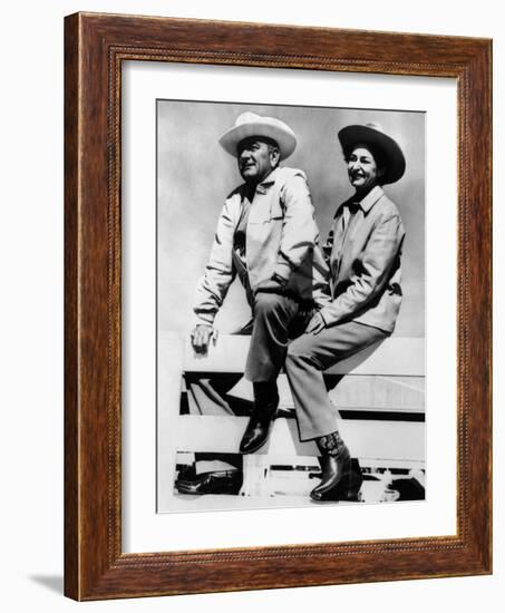 President Lyndon and Lady Bird Johnson Sitting on a Fence at the LBJ Ranch-null-Framed Photo