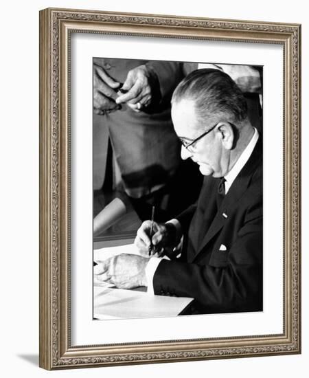 President Lyndon Johnson Signing the 1964 Civil Rights Bill, July 2, 1964-null-Framed Photo