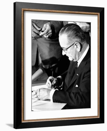 President Lyndon Johnson Signing the 1964 Civil Rights Bill, July 2, 1964-null-Framed Photo