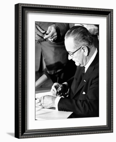 President Lyndon Johnson Signing the 1964 Civil Rights Bill, July 2, 1964-null-Framed Photo