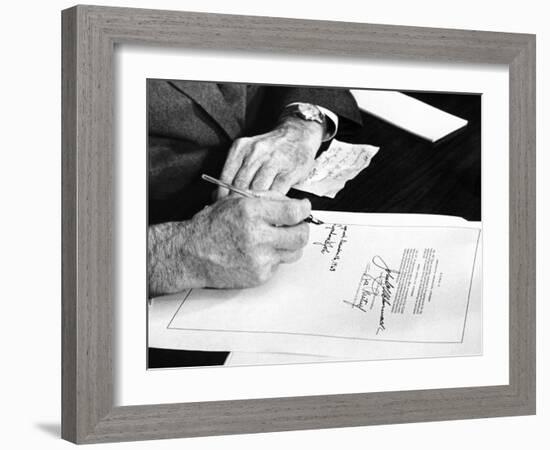 President Lyndon Johnson Signs a $102 Billion Education Bill at the White House Today-null-Framed Photo