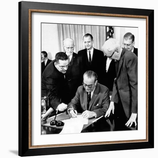 President Lyndon Johnson Signs the 24th Amendment to the Constitution-null-Framed Photo