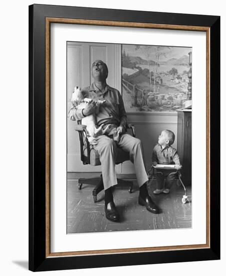 President Lyndon Johnson Sings with Dog Yuki While His Grandson Looks On, 1968-null-Framed Photo