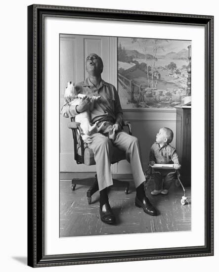 President Lyndon Johnson Sings with Dog Yuki While His Grandson Looks On, 1968-null-Framed Photo