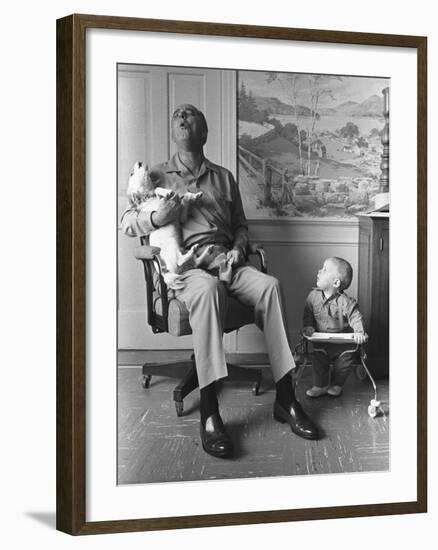 President Lyndon Johnson Sings with Dog Yuki While His Grandson Looks On, 1968-null-Framed Photo