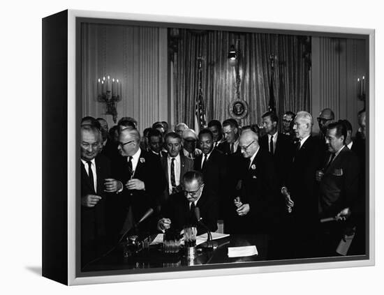 President Lyndon Johnson, Watched by Martin Luther King, Jr. Signing Civil Rights Act, July 2, 1964-null-Framed Stretched Canvas