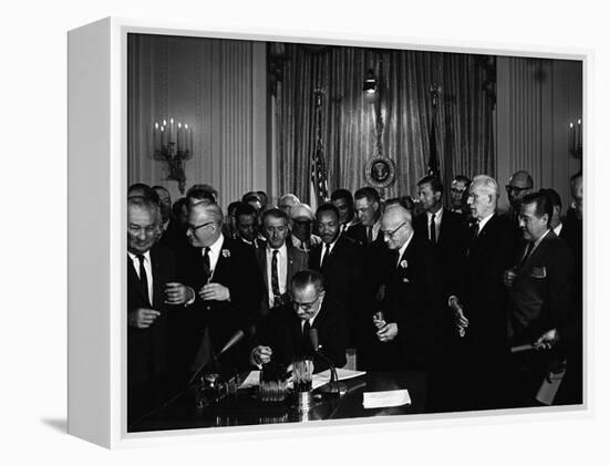 President Lyndon Johnson, Watched by Martin Luther King, Jr. Signing Civil Rights Act, July 2, 1964-null-Framed Stretched Canvas