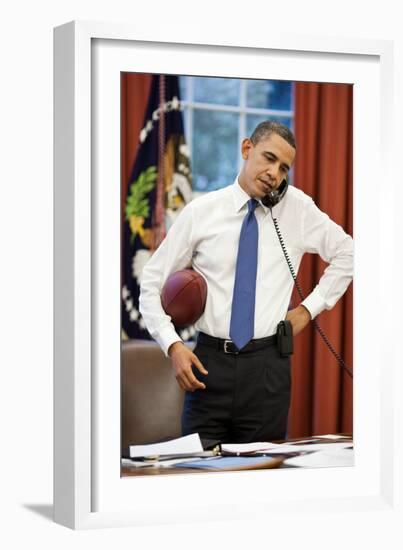 President Obama on the phone with House Speaker John Boehner:Oval Office, April 8, 2011-null-Framed Photo