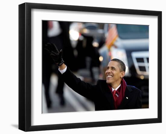 President Obama Waves as He Walks Down Pennsylvania Ave to the White House, January 20, 2009-null-Framed Photographic Print