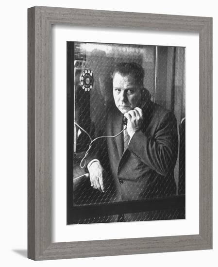 President of Teamsters Union Jimmy Hoffa Making Phone Call from Glassed-In Phone Booth-Hank Walker-Framed Premium Photographic Print