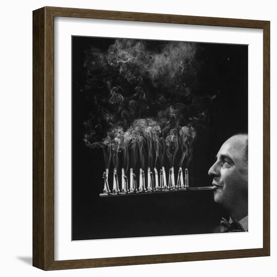President of Zeus Corp, Robert L. Stern, Smoking Cigarettes from His Self Designed Cigarette Holder-Yale Joel-Framed Photographic Print
