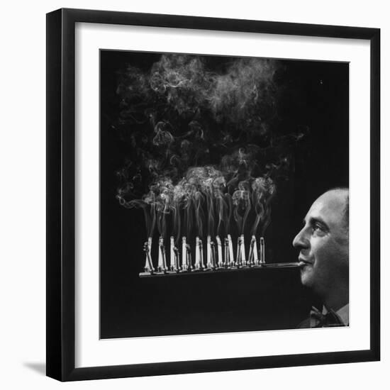 President of Zeus Corp, Robert L. Stern, Smoking Cigarettes from His Self Designed Cigarette Holder-Yale Joel-Framed Photographic Print