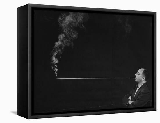 President of Zeus Corp., Robert Stern, Smoking from Self-Designed Four Foot Long Cigarette Holder-Yale Joel-Framed Premier Image Canvas