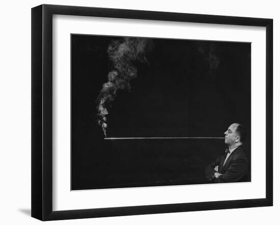 President of Zeus Corp., Robert Stern, Smoking from Self-Designed Four Foot Long Cigarette Holder-Yale Joel-Framed Photographic Print