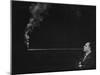 President of Zeus Corp., Robert Stern, Smoking from Self-Designed Four Foot Long Cigarette Holder-Yale Joel-Mounted Photographic Print