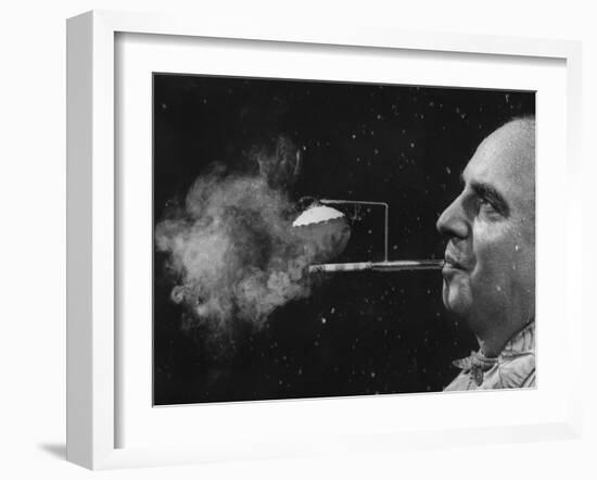 President of Zeus Corp., Robert Stern, Smoking from Self-Designed "Rainy Day" Cigarette Holder-Yale Joel-Framed Photographic Print