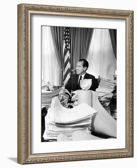 President Richard Nixon Sitting Among Stacks of Telegrams Supporting His Vietnam Policy-null-Framed Photo