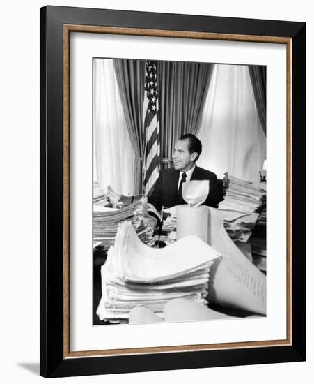 President Richard Nixon Sitting Among Stacks of Telegrams Supporting His Vietnam Policy-null-Framed Photo