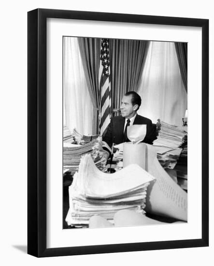 President Richard Nixon Sitting Among Stacks of Telegrams Supporting His Vietnam Policy-null-Framed Photo