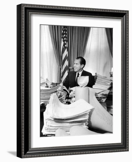 President Richard Nixon Sitting Among Stacks of Telegrams Supporting His Vietnam Policy-null-Framed Photo