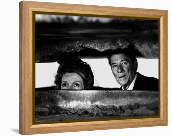 President Ronald Reagan and First Lady Nancy Reagan Peer out of a World War II Bunker-null-Framed Premier Image Canvas