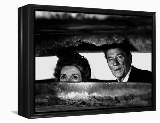 President Ronald Reagan and First Lady Nancy Reagan Peer out of a World War II Bunker-null-Framed Premier Image Canvas