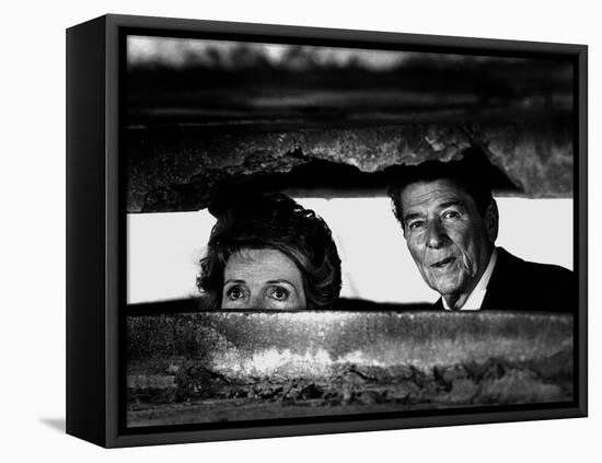 President Ronald Reagan and First Lady Nancy Reagan Peer out of a World War II Bunker-null-Framed Premier Image Canvas