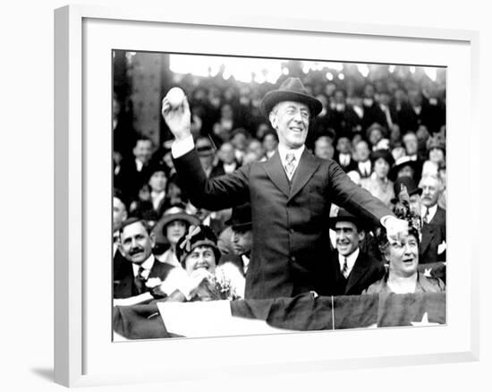 President Woodrow Wilson Throwing Out the First Ball, Opening Day, 1916--Framed Photo