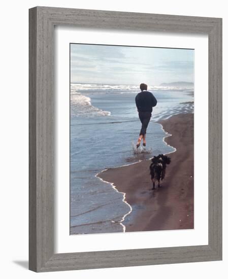 Presidential Candidate Bobby Kennedy and His Dog, Freckles, Running on Beach-Bill Eppridge-Framed Photographic Print