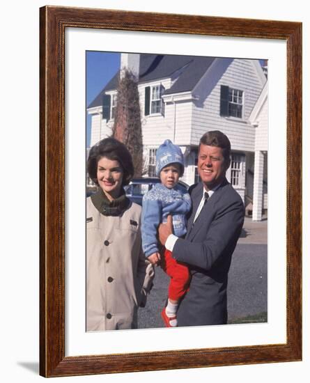 Presidential Candidate John F. Kennedy Holding Daughter with Wife Outside Home on Election Day-Paul Schutzer-Framed Photographic Print