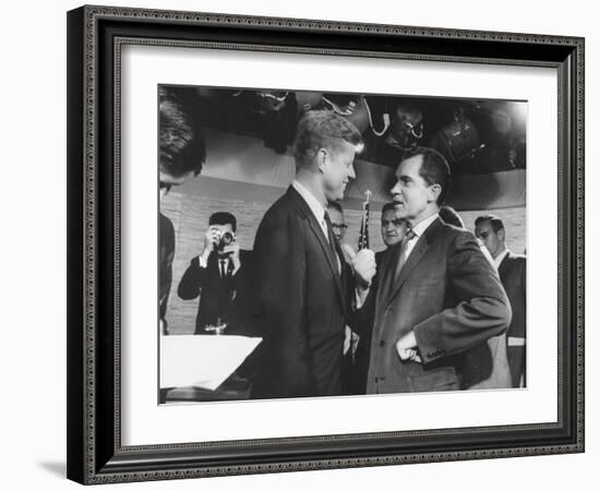 Presidential Candidate John F. Kennedy Speaking to Fellow Candidate Richard M. Nixon-Ed Clark-Framed Photographic Print