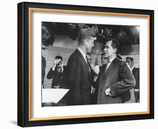 Presidential Candidate John F. Kennedy Speaking to Fellow Candidate Richard M. Nixon-Ed Clark-Framed Photographic Print