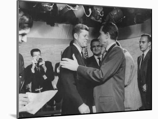 Presidential Candidate John F. Kennedy Speaking to Fellow Candidate Richard M. Nixon-Ed Clark-Mounted Photographic Print