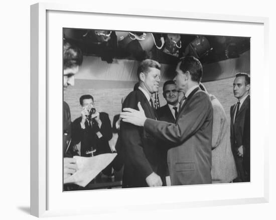 Presidential Candidate John F. Kennedy Speaking to Fellow Candidate Richard M. Nixon-Ed Clark-Framed Photographic Print